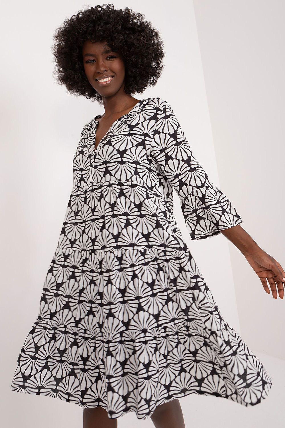 Elegant summer viscose daydress by Sublevel featuring a striking black and white floral print, 3/4 sleeves, and a delicate heart neckline, perfect for casual yet sophisticated occasions.
