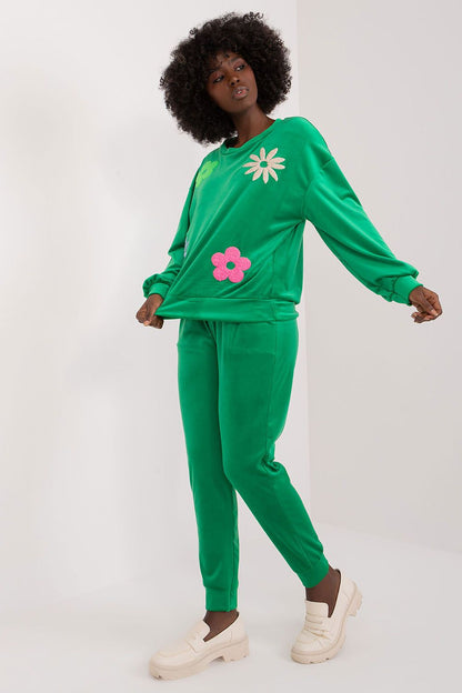 Stylish green velour floral set with a relaxed fit, including long sleeve top and pants, beautifully showcased by a model, by Italy Moda.