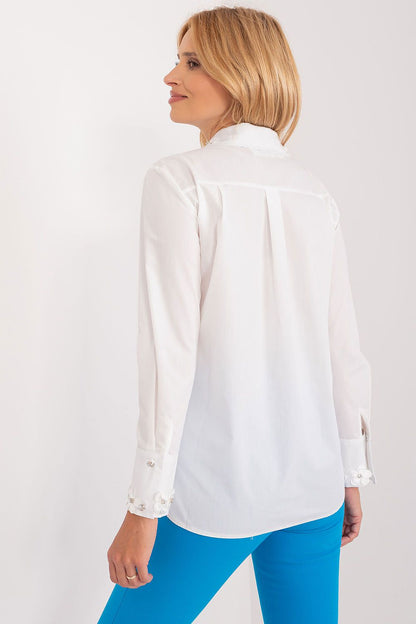 Elegant women's cotton shirt by Lakerta, featuring a classic design with long sleeves, a sophisticated collar, and intricate embroidered flowers with zircons on the cuffs, showcased from the back.