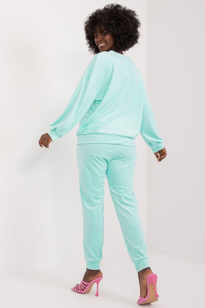 Back view of the elegant mint velour set by Italy Moda, designed for effortless style and comfort, featuring a contemporary fit that flatters the silhouette.