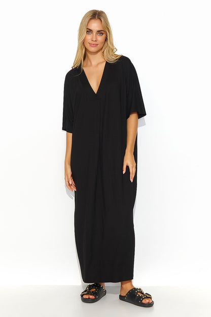Front view of a stunning black Makadamia long dress showcasing a flattering V neckline and relaxed fit, ideal for chic summer outings.