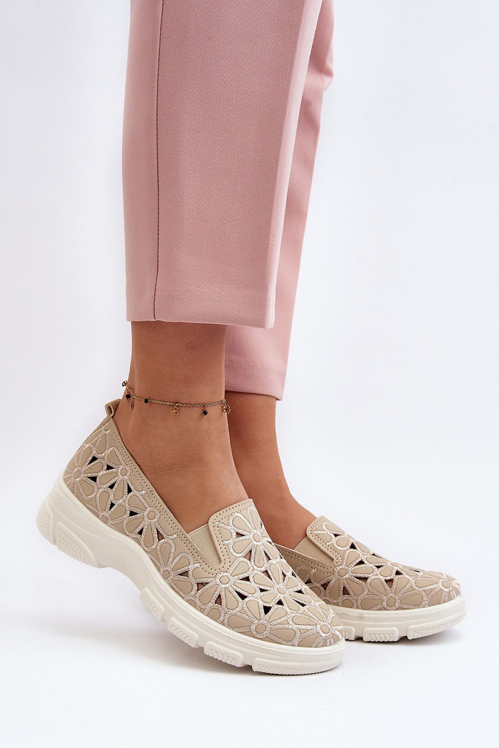 Chic luxury eco leather women's half shoes in a light beige tone with floral openwork, ideal for effortless elegance. By Step in Style.