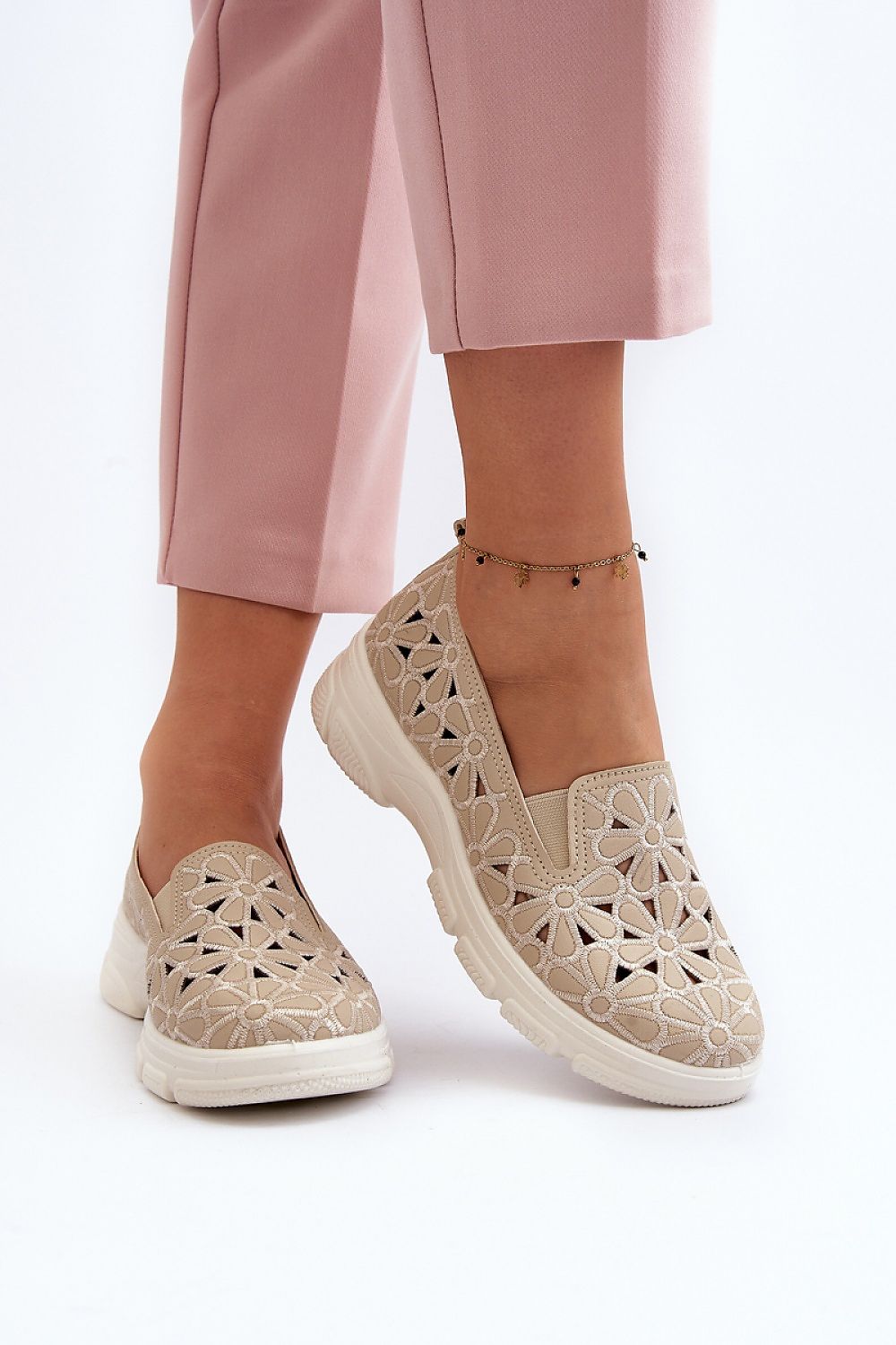 Fashionable view of luxury eco leather women's half shoes with intricate floral openwork, perfect for casual or dressy occasions. By Step in Style.