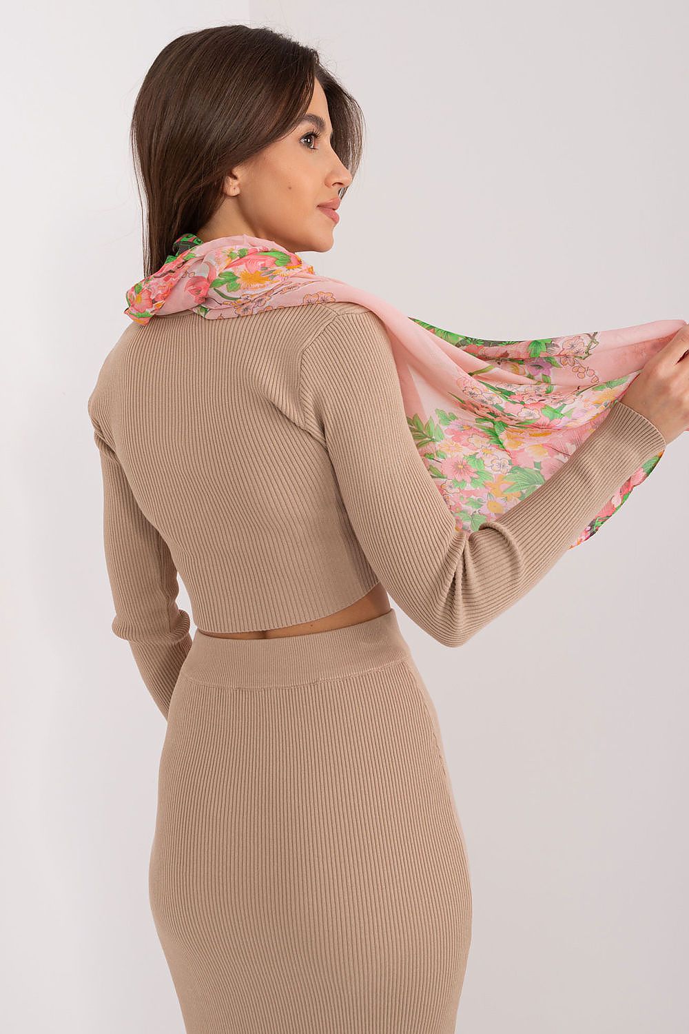 Stylish floral print scarf by AT, elegantly worn by a model, highlighting its luxurious viscose texture and charming design, perfect for sophisticated styling.