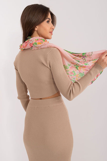 Stylish floral print scarf by AT, elegantly worn by a model, highlighting its luxurious viscose texture and charming design, perfect for sophisticated styling.