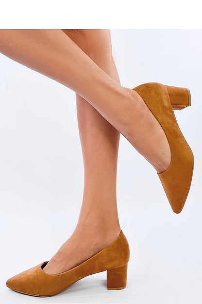 Elegant tan suede block heel pumps by Inello, highlighting a refined silhouette and modest 5.5cm heel, perfect for both casual and formal settings.