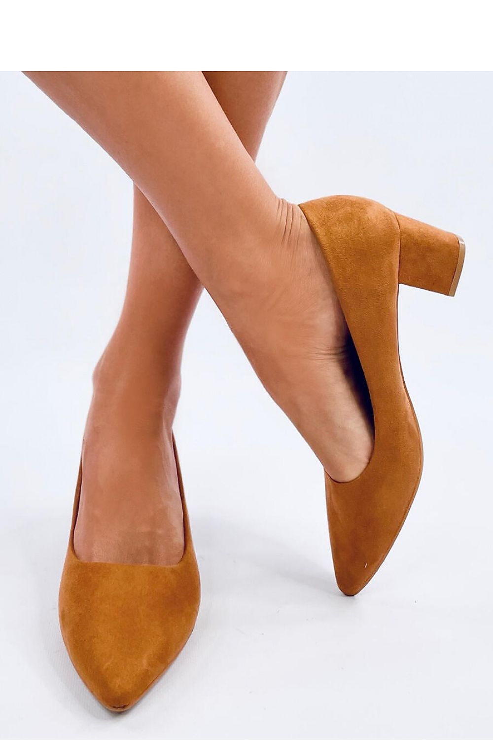Chic and comfortable block heel pumps in luxurious tan suede, designed by Inello with a tapered toe for a timeless appeal and graceful fit.