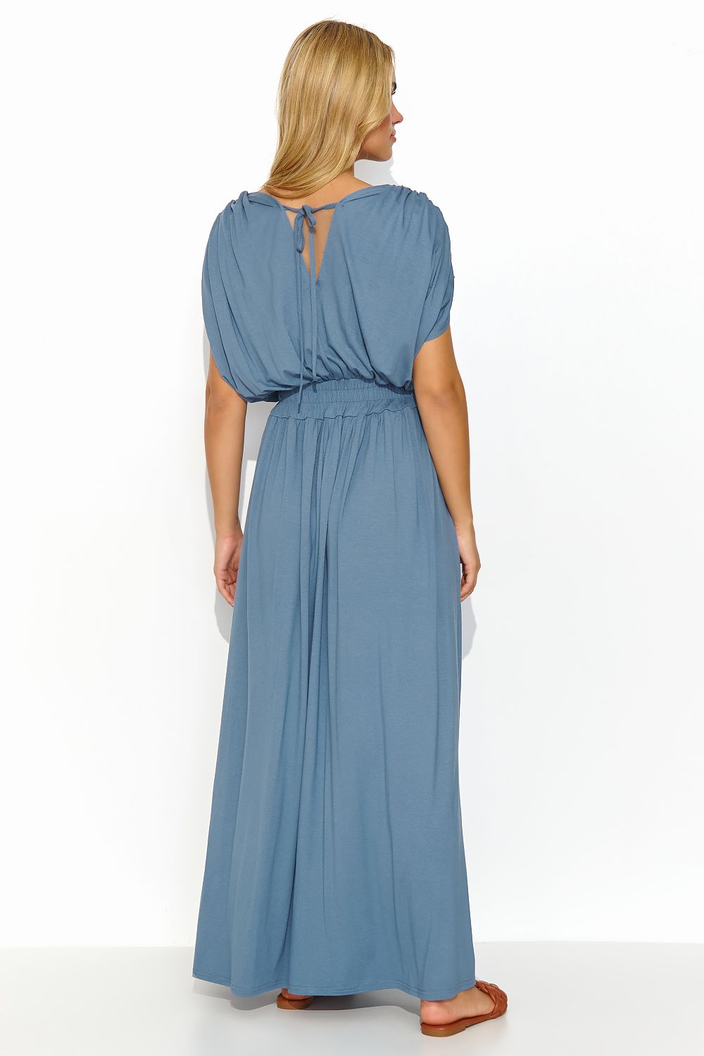 Sophisticated Makadamia long lightweight knit daydress in denim blue, displaying a back tie and gently draping sleeves for a refined feminine look.