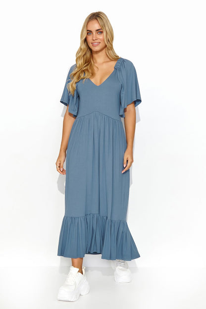 Elegant long ruffle dress in blue by Makadamia, featuring a deep-cut neckline and feminine silhouette, perfect for summer occasions.