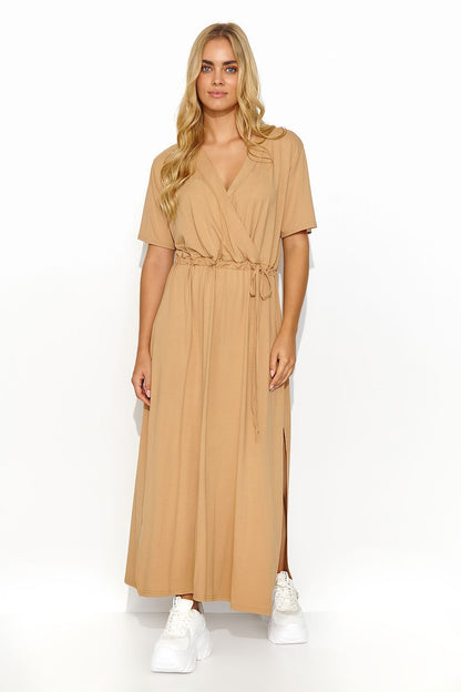 Stylish long Makadamia daydress in rich caramel colour, designed with a tie waist and heart neckline, ideal for a sophisticated summer wardrobe.