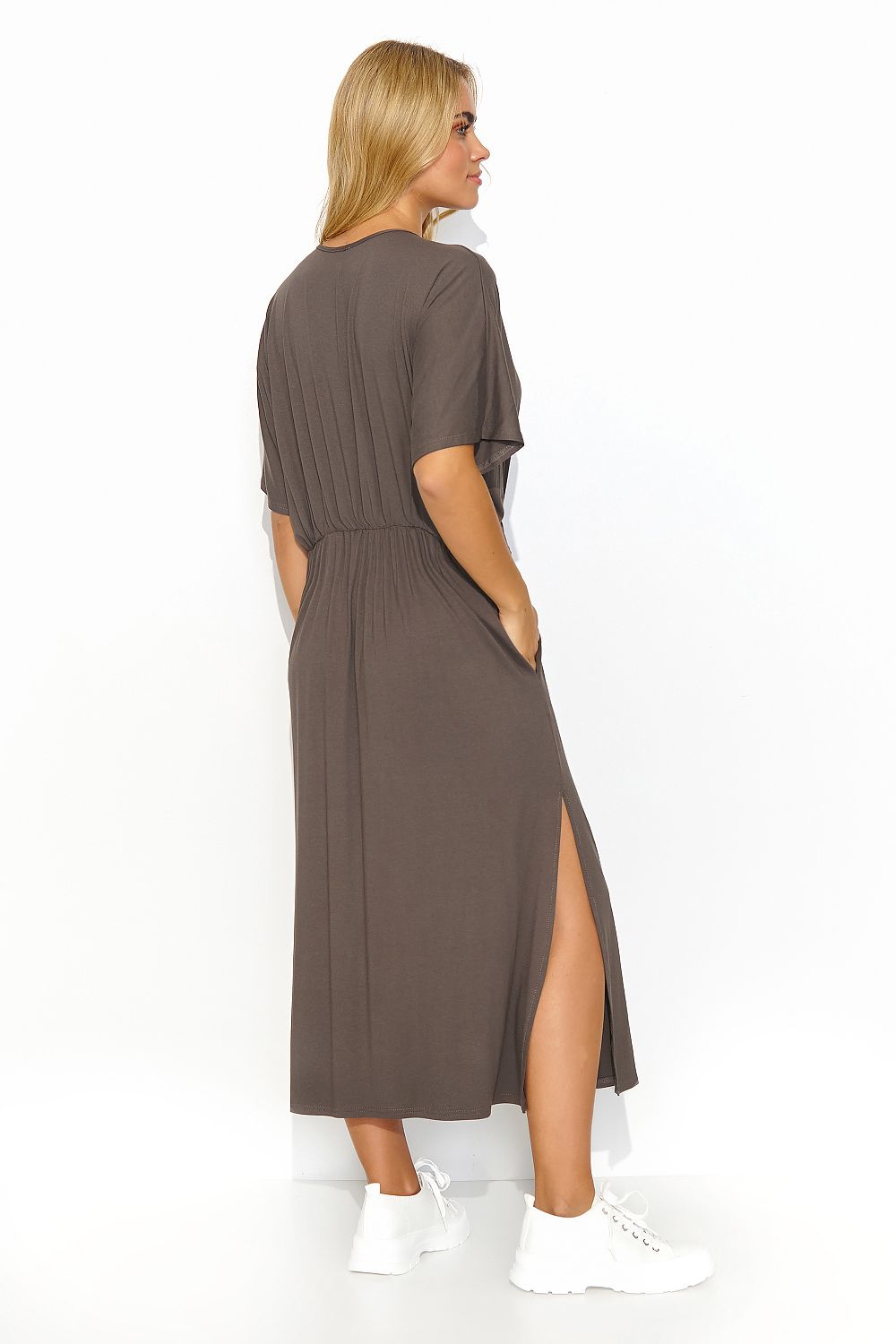 Luxurious lightweight knit fabric of the Makadamia Midi Dress, showcasing comfort and sophistication for warm days.