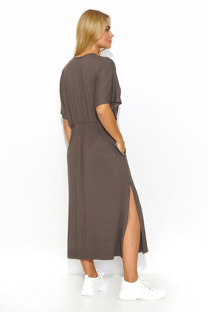Luxurious lightweight knit fabric of the Makadamia Midi Dress, showcasing comfort and sophistication for warm days.
