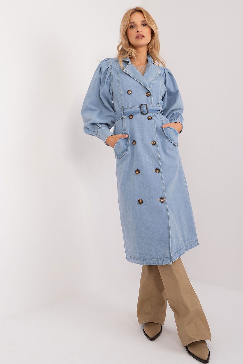 Luxury denim trench coat by NM, designed for spring and summer with long sleeves, belted waist, and elegant pockets.
