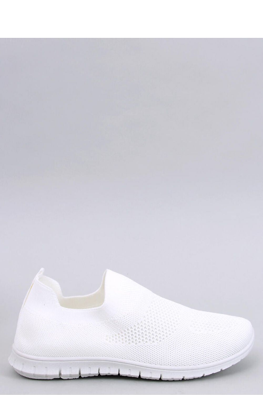 Luxurious Inello women's slip-on sneakers made from airy sock fabric, featuring a springy sole for ultimate comfort, showcased in an elegant display.