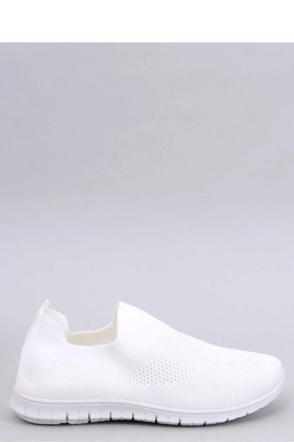 Luxurious Inello women's slip-on sneakers made from airy sock fabric, featuring a springy sole for ultimate comfort, showcased in an elegant display.