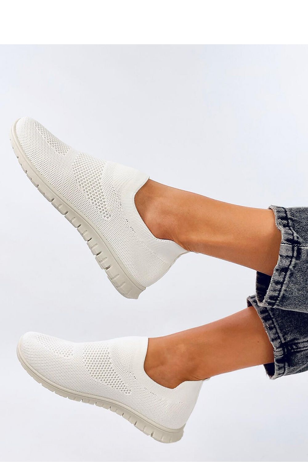 Luxurious women's slip-on sneakers by Inello showcasing airy fabric and springy sole, ideal for ultimate comfort during walks.
