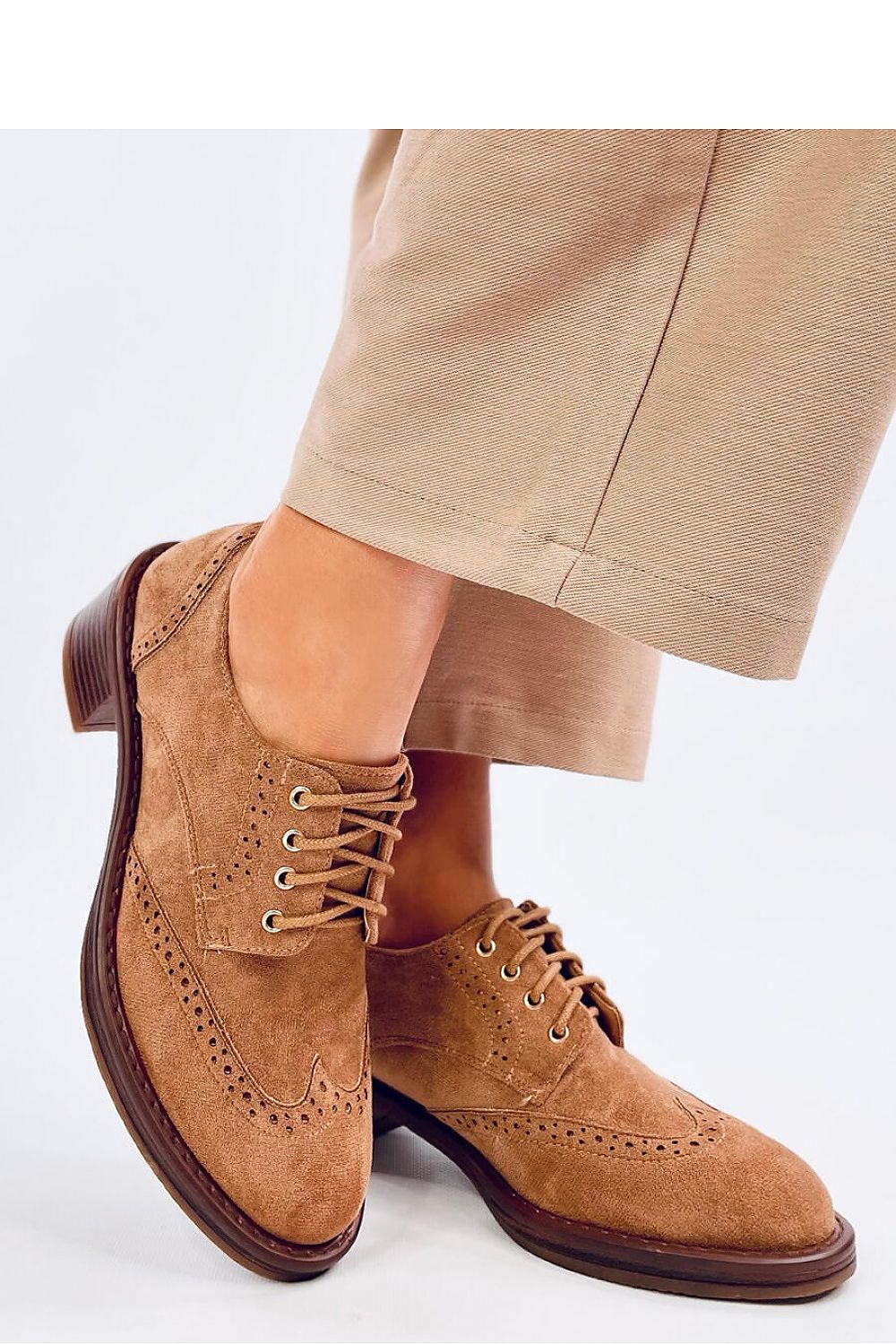 Stylish and comfortable ecological suede moccasin shoes for women from Inello, showcasing a chic lace-up style and a supportive 5cm heel.