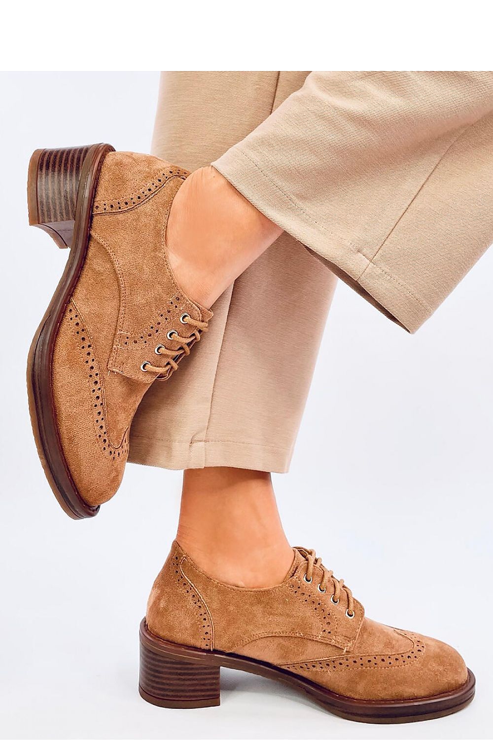 Luxurious women's lace-up moccasins by Inello, crafted from ecological suede with a refined design and a comfortable 5cm heel for everyday elegance.