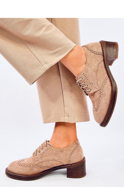 Sophisticated lace-up moccasins for women by Inello, designed with a luxurious eco-friendly suede and a comfortable heel for elegant wear.