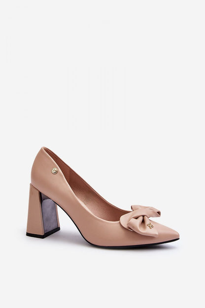 Stylish pointed toe pumps with a feminine bow detail, crafted by Step in Style for a luxurious look and feel.