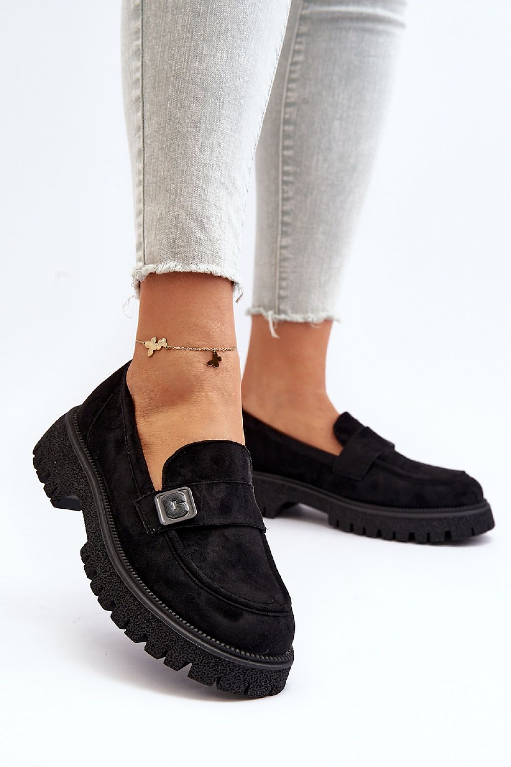 Close-up view of luxury eco-suede moccasins from Step in Style, showcasing the strap detail and rounded toe design for sophisticated spring wear.