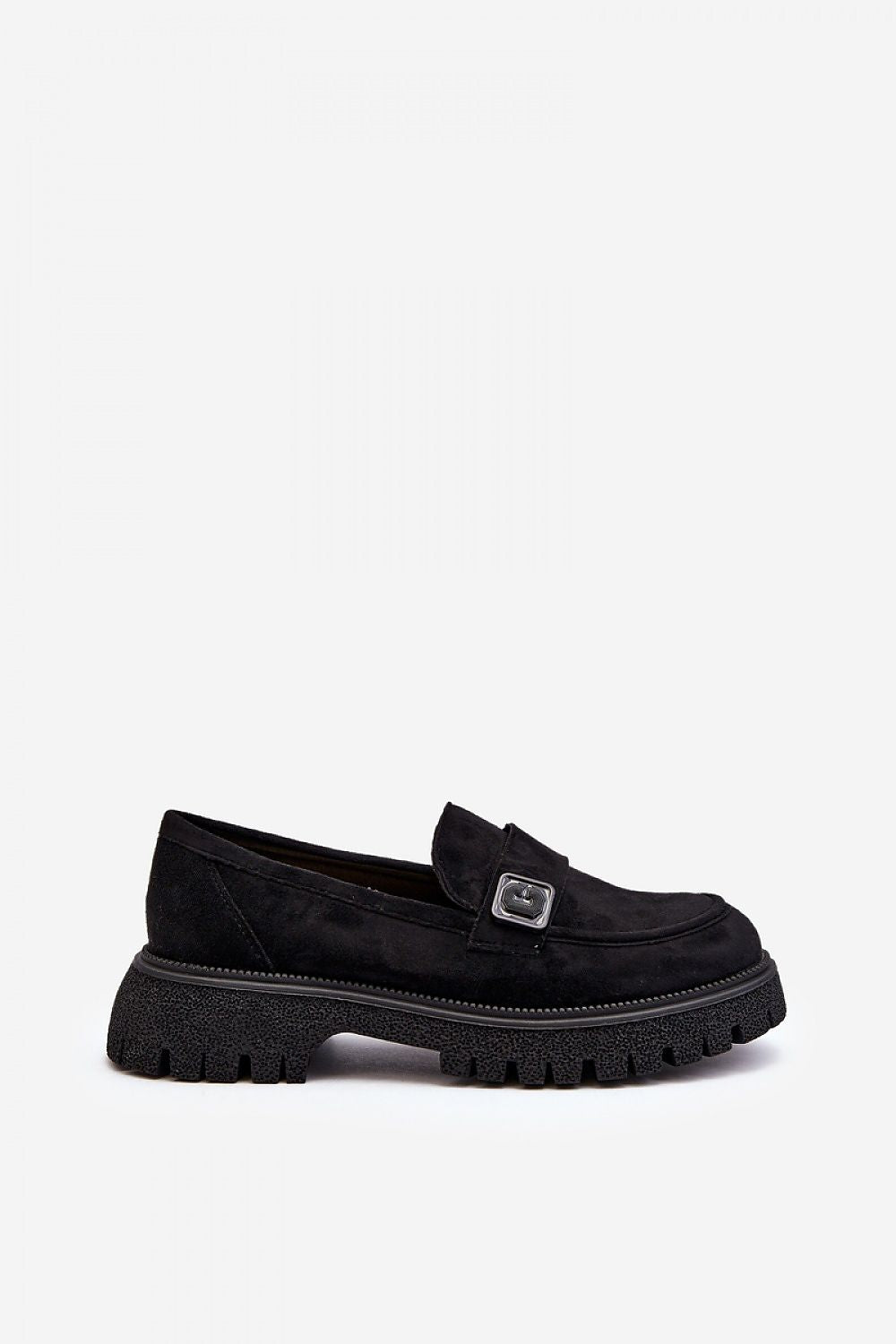 Luxurious Step in Style eco-suede moccasins with a flat heel, ideal for versatile spring styling, demonstrating chic comfort and elegance.