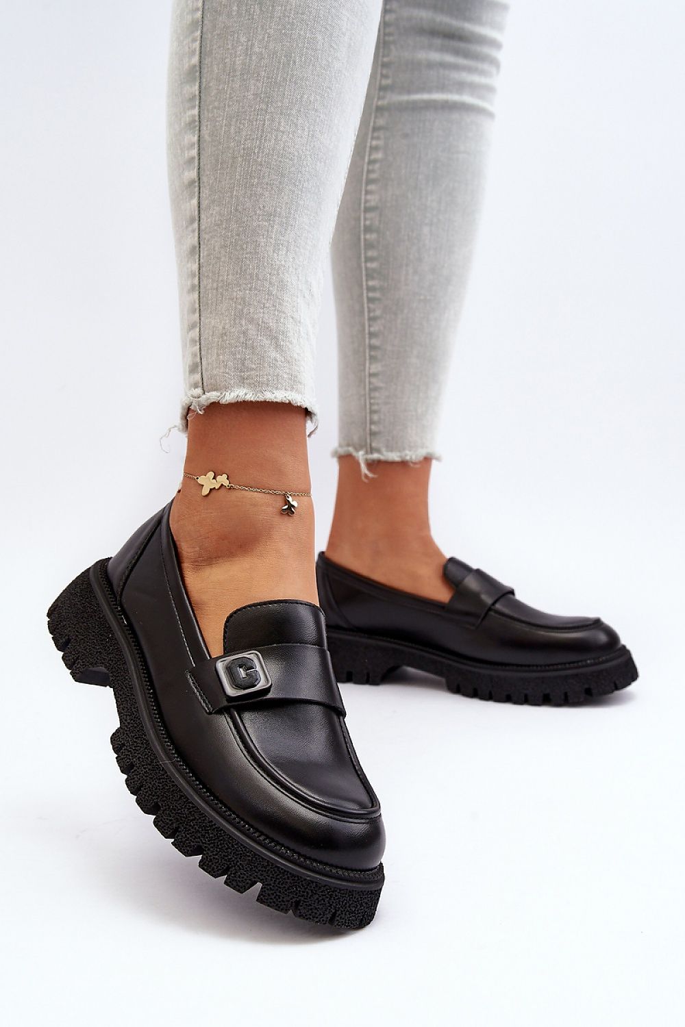 Elegantly designed eco-suede moccasins by Step in Style, featuring a massive flat heel and chic strap, ideal for luxurious spring fashion.