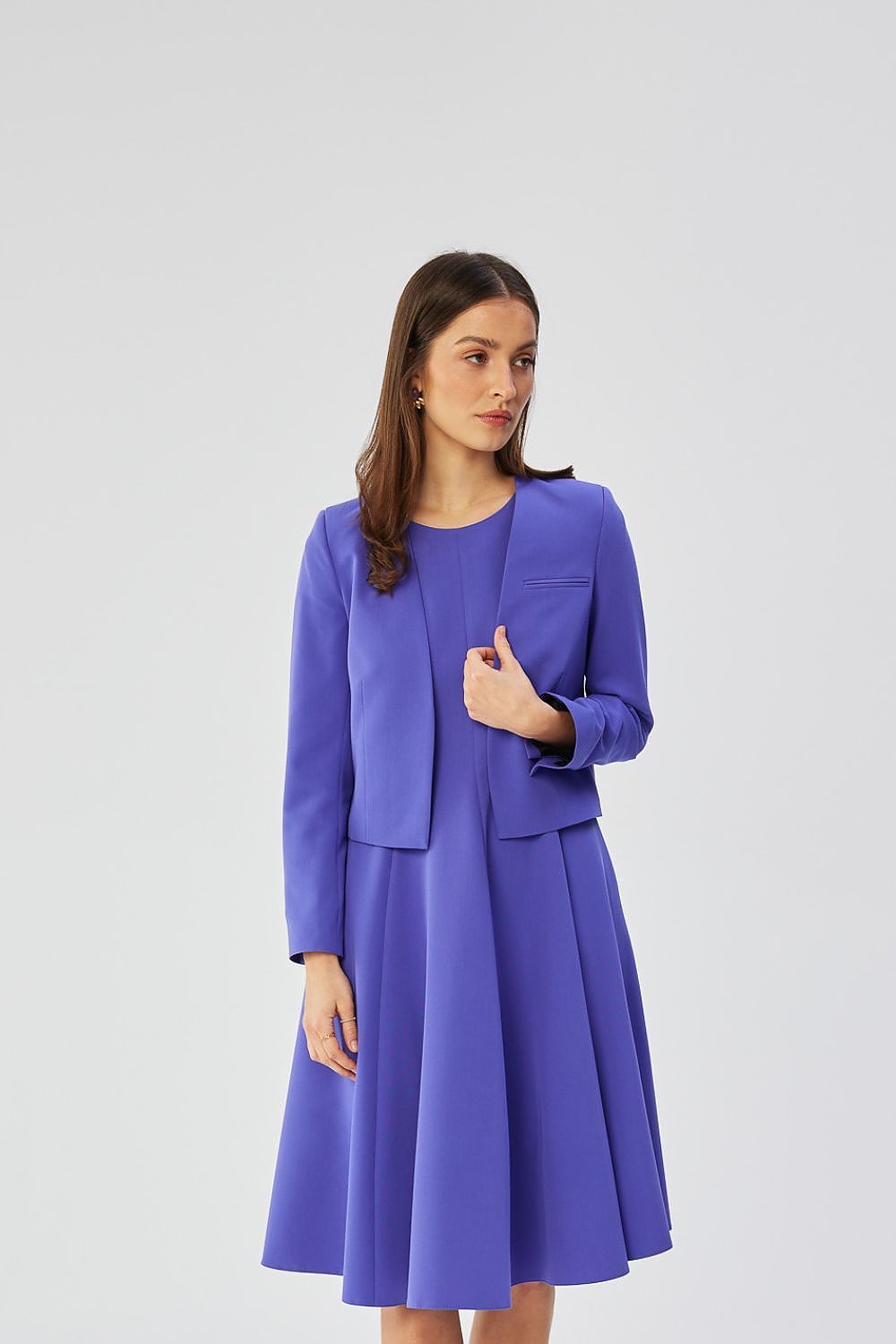 Stylove women's elegant short jacket displayed on a white background, emphasizing its beautiful design and chic collarless silhouette.