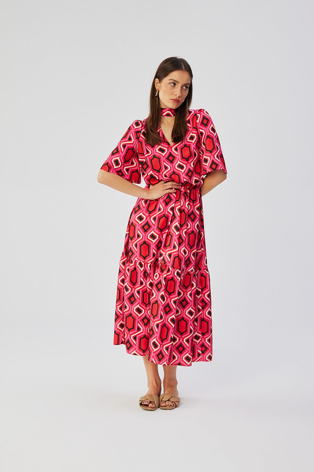 Stylove Women's Maxi Dress worn in a stylish setting, highlighting the flared cut and lightweight design for warm weather.