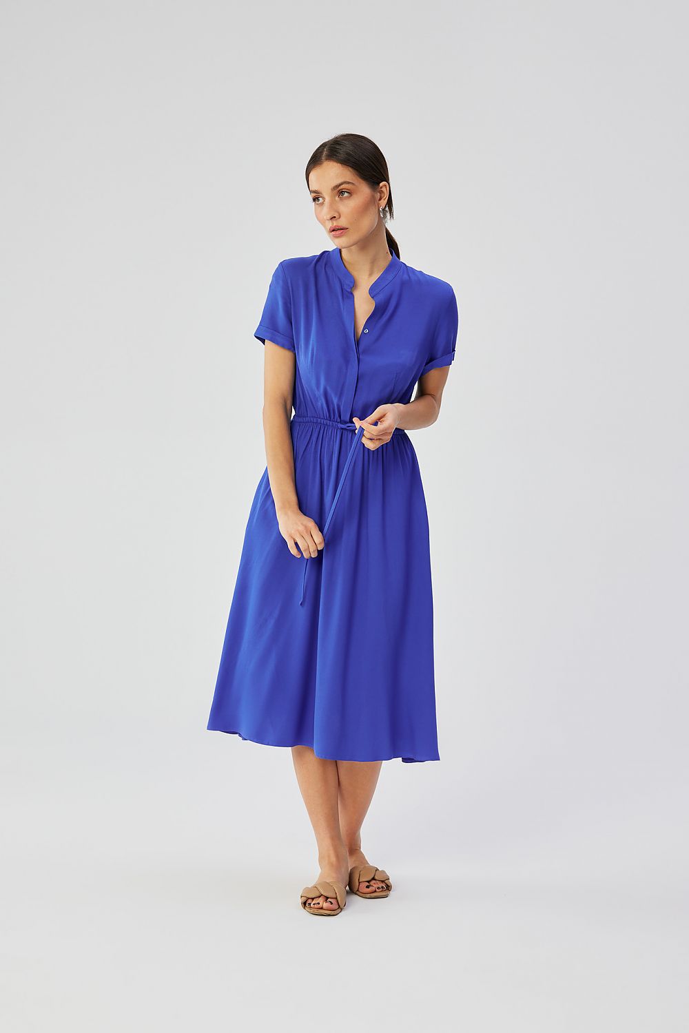 Elegant 100% Viscose Daydress by Stylove, showcasing subtle flare, belted waist, and stand-up collar. Handmade in Poland, perfect for summer styling.