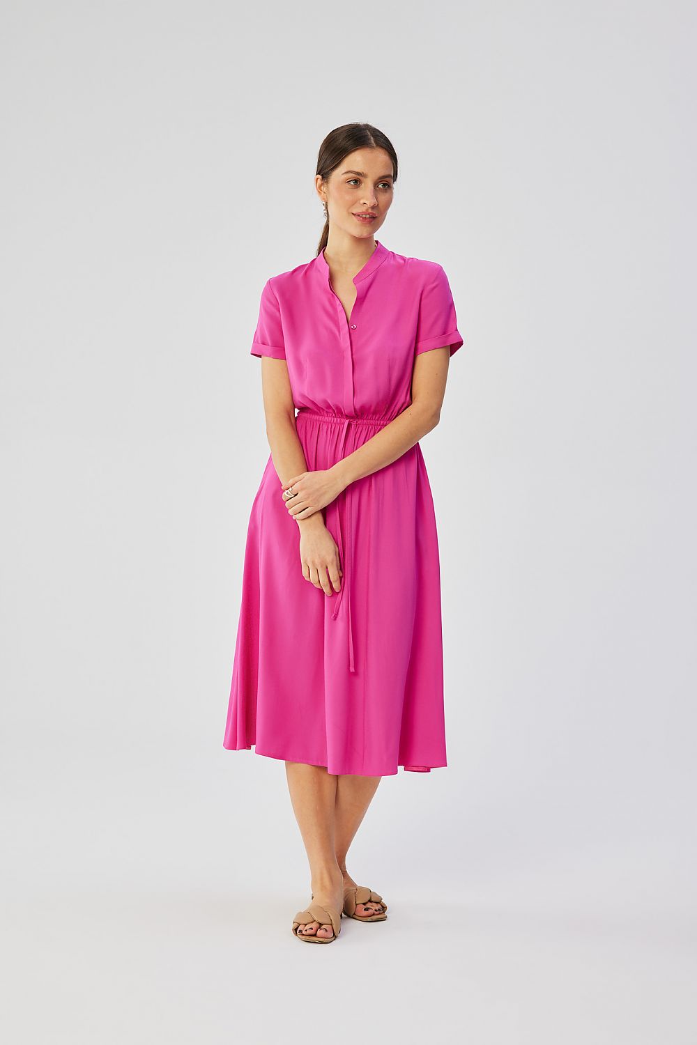 Stylove's sophisticated 100% viscose daydress showcasing a feminine silhouette with subtle flare and practical design - Artisanal quality from Poland.