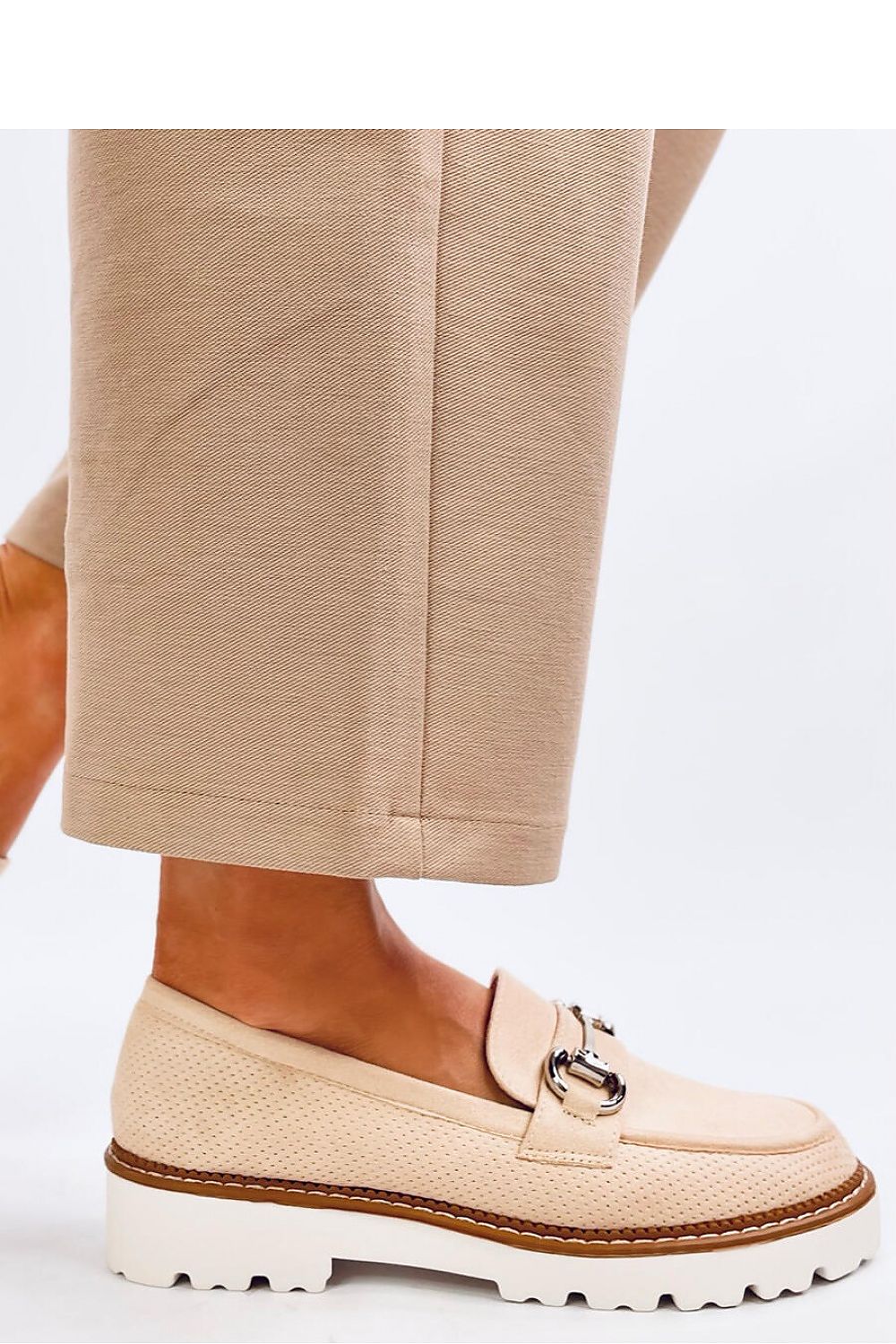 Chic Inello women's moccasins available in black, beige, and white, designed for the sophisticated woman seeking an elegant and comfortable footwear option.