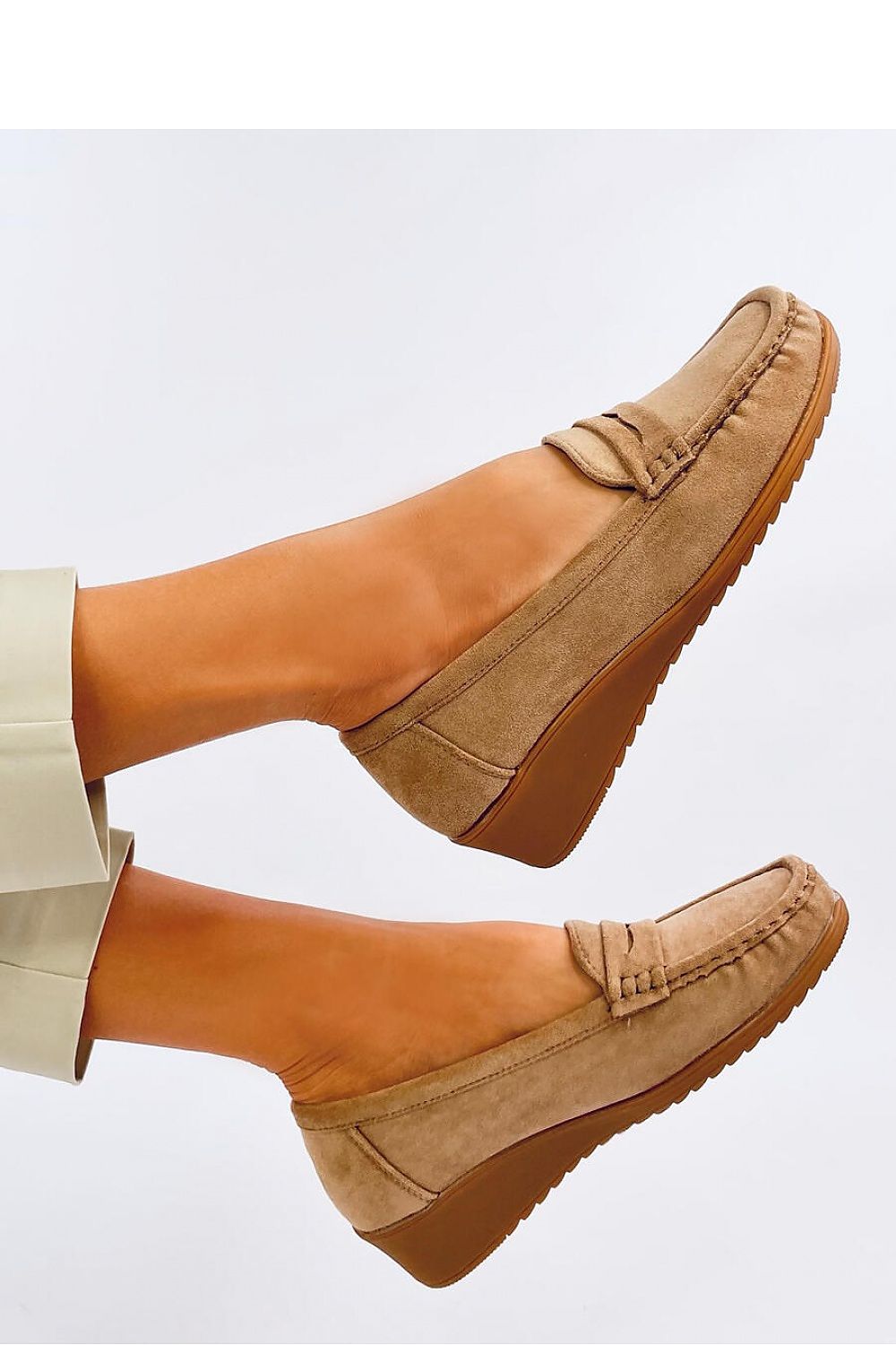 Luxury suede moccasins for women by Inello with a comfortable 4cm heel and elegant timeless stitching detail.
