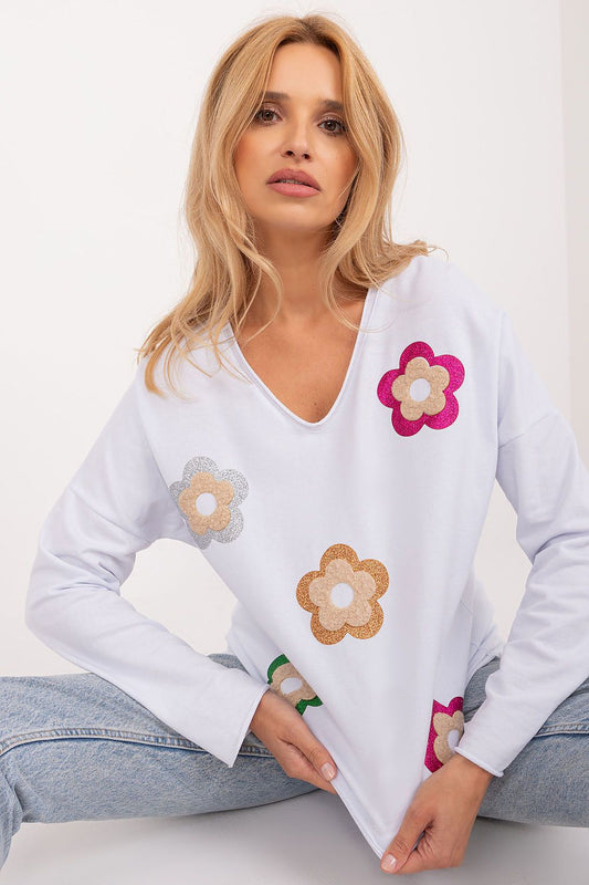 Charming close-up of the floral design on the Italy Moda blouse, showcasing exquisite detailing and a lightweight fabric perfect for stylish casual wear.