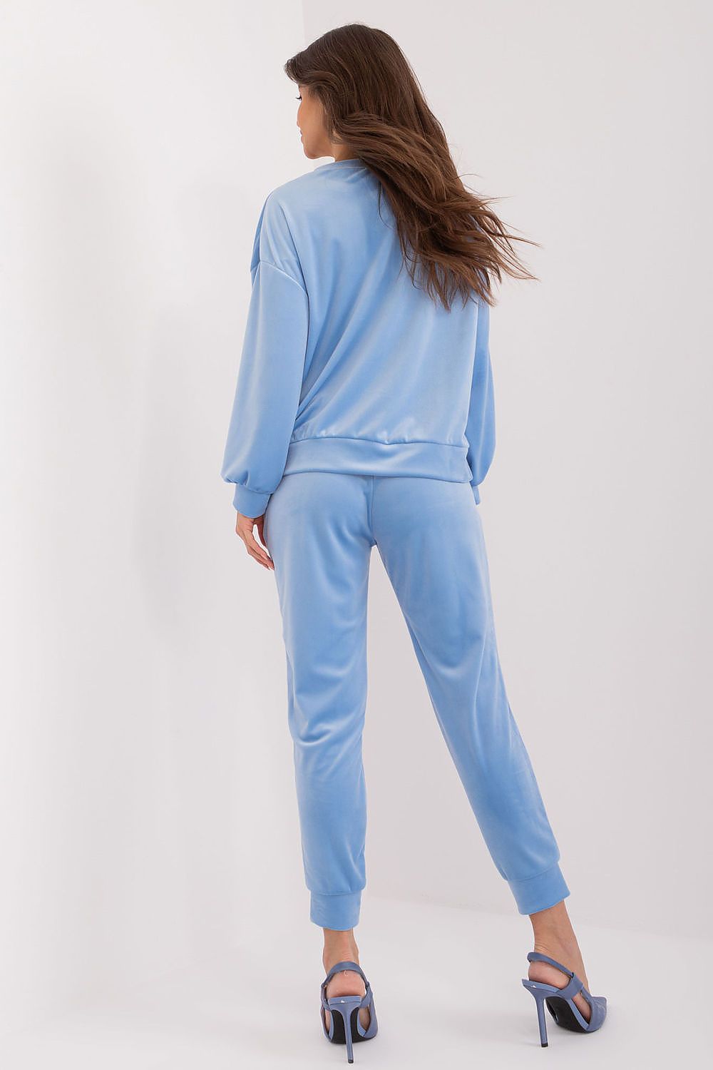 Luxury velour sweatshirt and high waist pants set by Italy Moda, featuring a decorative bow front and adjustable waist tie for a sophisticated casual look.