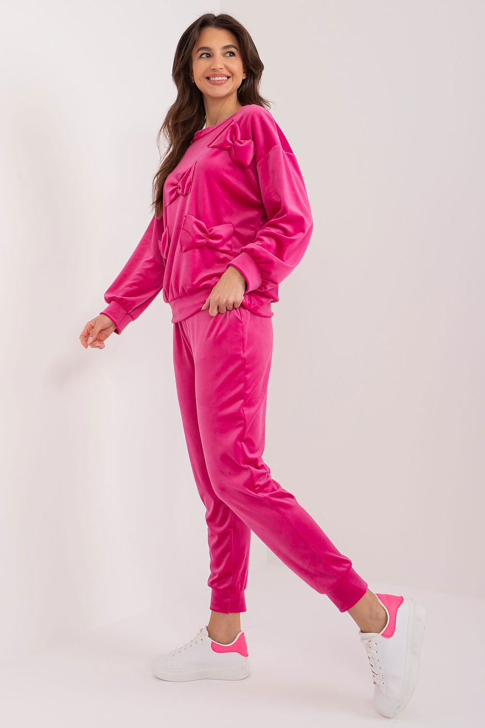 Luxurious Italy Moda velour set featuring an elegant sweatshirt and pants combo adorned with decorative bows, perfect for stylish casual wear.