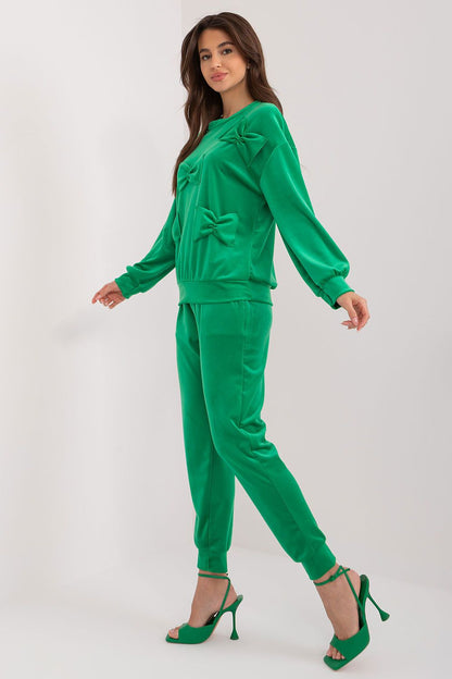 Luxurious Italy Moda velour pants with high waist and drawstring, designed for optimal comfort and style.