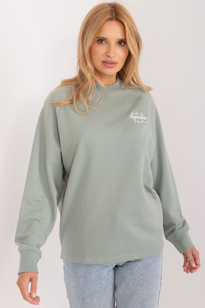 Eco-Friendly women's cotton sweatshirt by Sublevel, featuring intricate embroidery and casual comfort, perfect for a luxurious yet sustainable wardrobe.