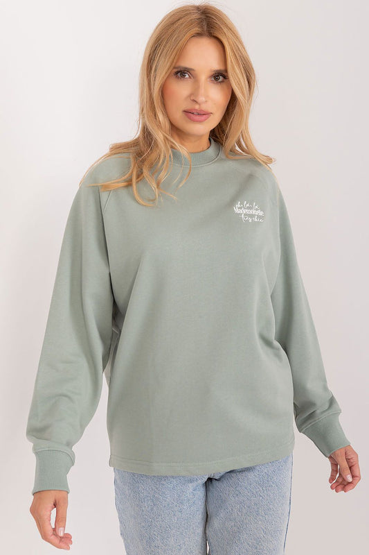Eco-Friendly women's cotton sweatshirt by Sublevel, featuring intricate embroidery and casual comfort, perfect for a luxurious yet sustainable wardrobe.