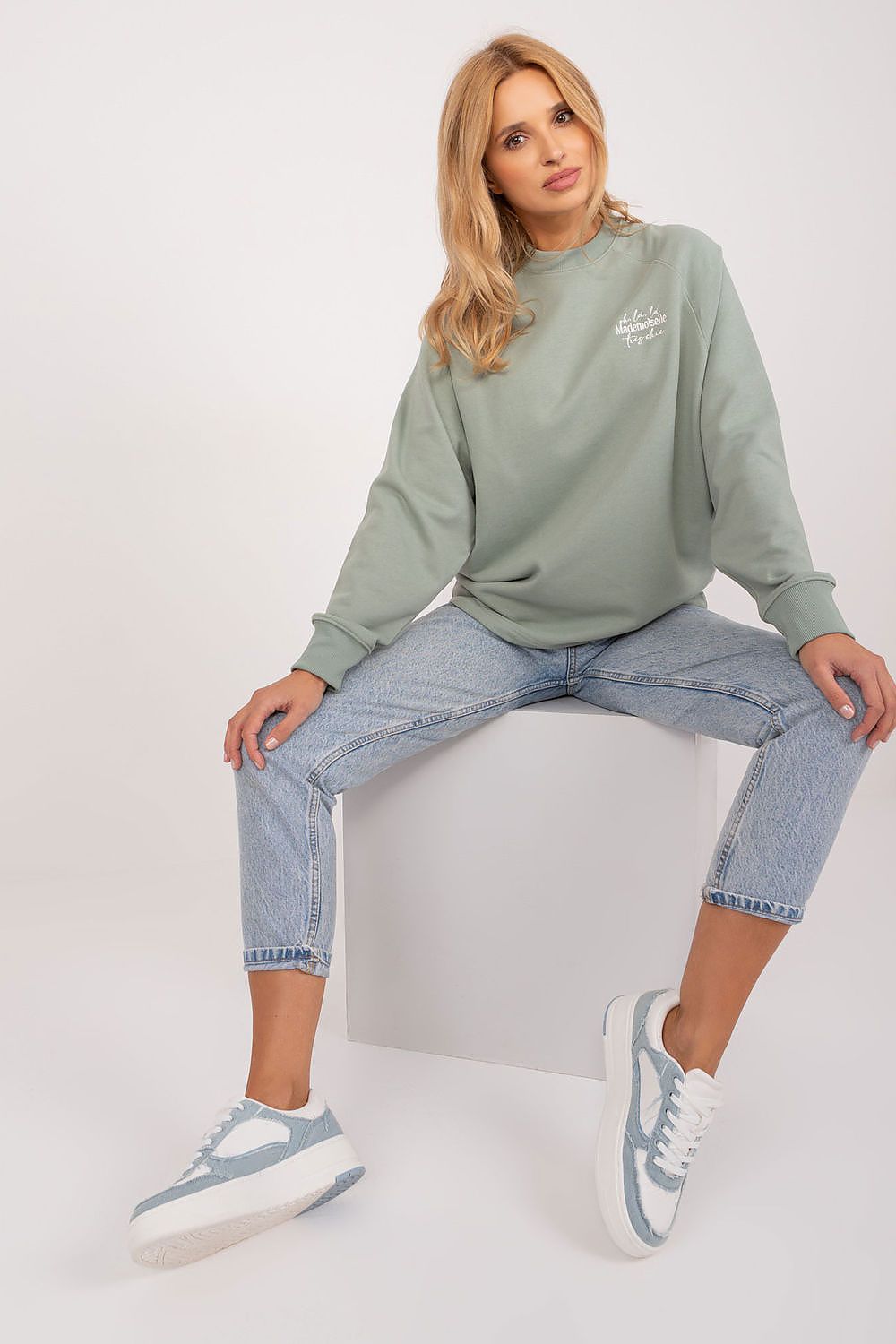 Chic and versatile women's sweatshirt by Sublevel, crafted from high-quality cotton, showcasing a stylish round neckline and elegant embroidery for eco-conscious fashion.