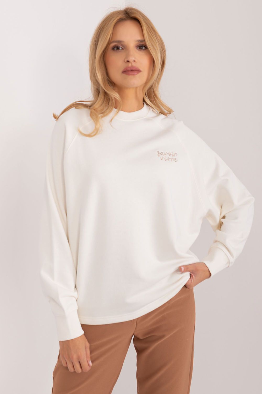 Luxurious eco-friendly women's cotton sweatshirt by Sublevel, featuring elegant embroidery, perfect for stylish casual wear.