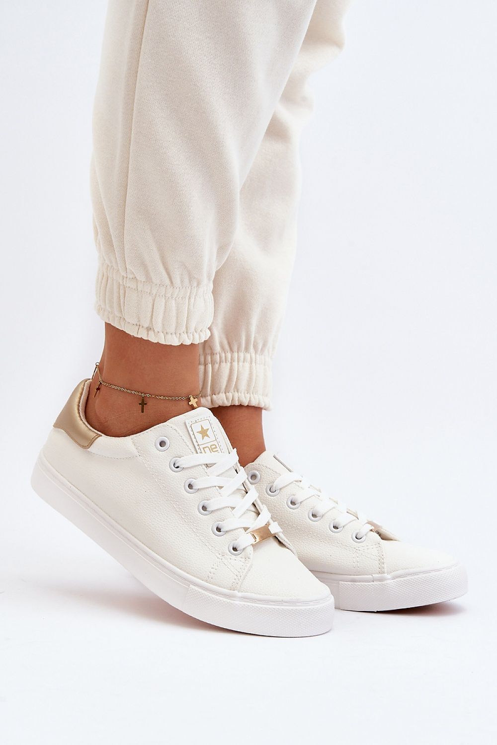 Elegant women’s eco leather classic sneakers by Step in Style, designed for comfort with a rubber sole, showcasing a chic spring-summer aesthetic.