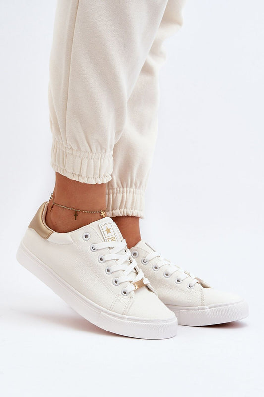 Elegant women’s eco leather classic sneakers by Step in Style, designed for comfort with a rubber sole, showcasing a chic spring-summer aesthetic.