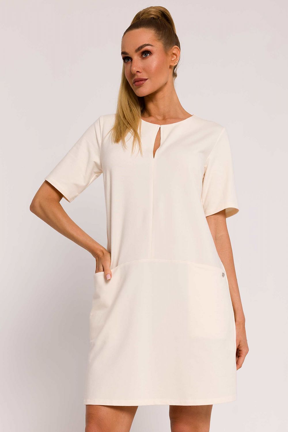 Moe A-Line Knit Dress with Pockets - Elegant summer fashion design in premium cotton blend, showcasing feminine silhouette with short sleeves and practical side pockets, perfect for warm days.