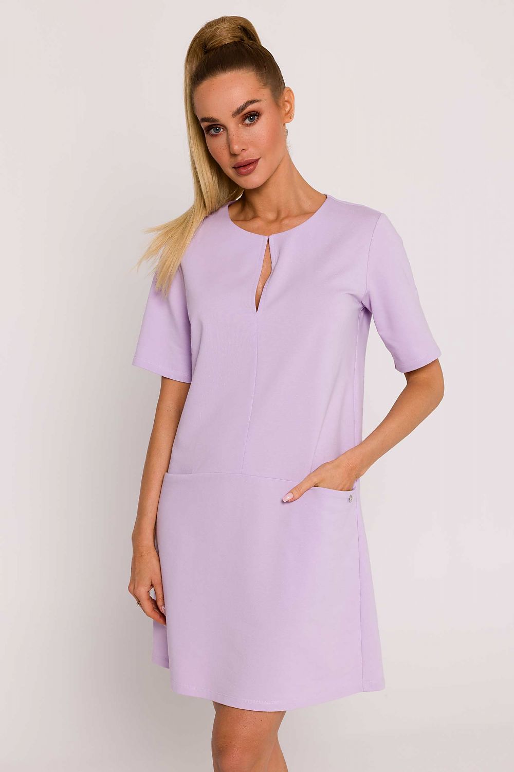 Elegant silhouette of the Moe A-Line Knit Dress, featuring a delicate neckline and short sleeves, perfect for stylish summer outings.