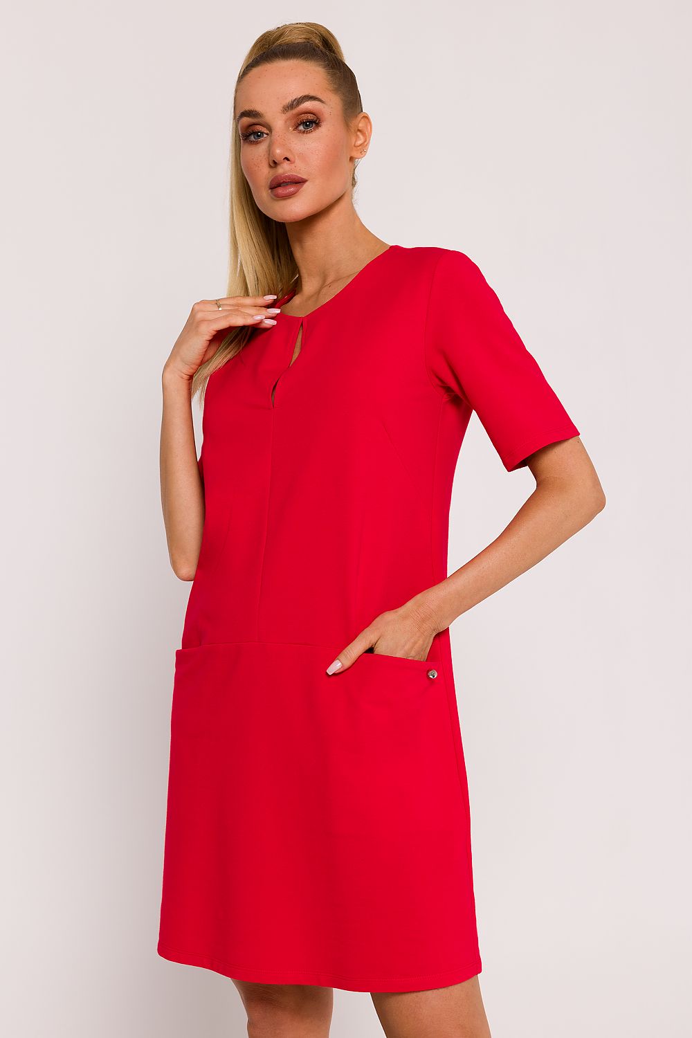 Elegant Moe A-Line Knit Dress in Premium Cotton Blend showcasing a flattering silhouette and side pockets, perfect for summer fashion.