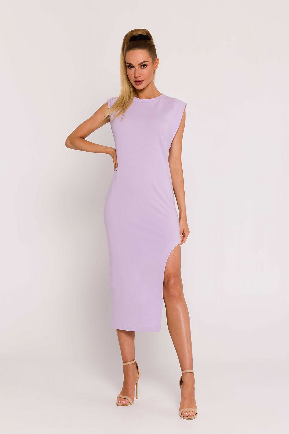 The unique leg cutout design of Moe's stylish midi dress, perfect for enhancing elegance and sensuality in every movement.