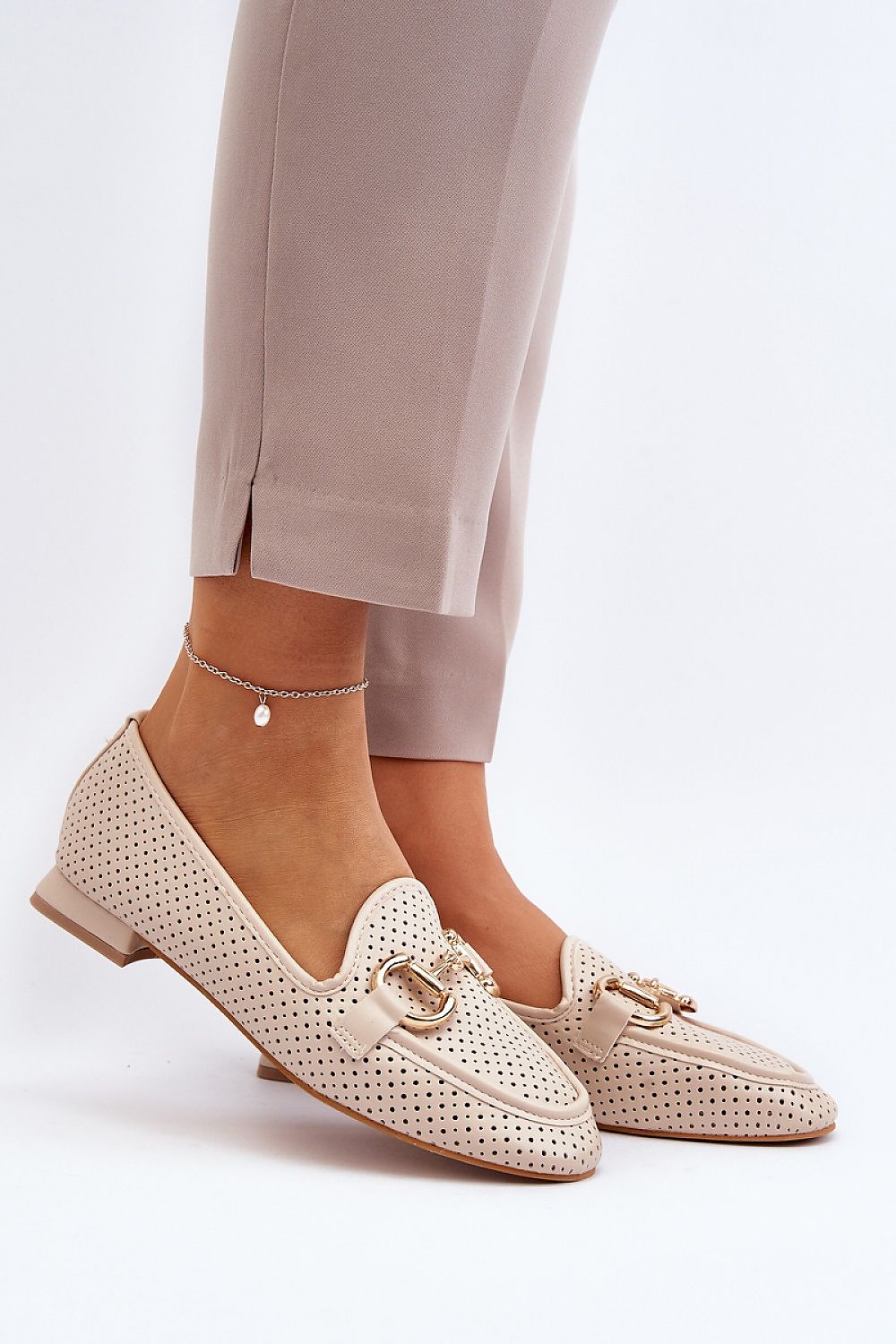 Elegant eco leather moccasin slip-ons by Step in Style, featuring a unique front ornament and comfortable insole, perfect for sophisticated casual wear.