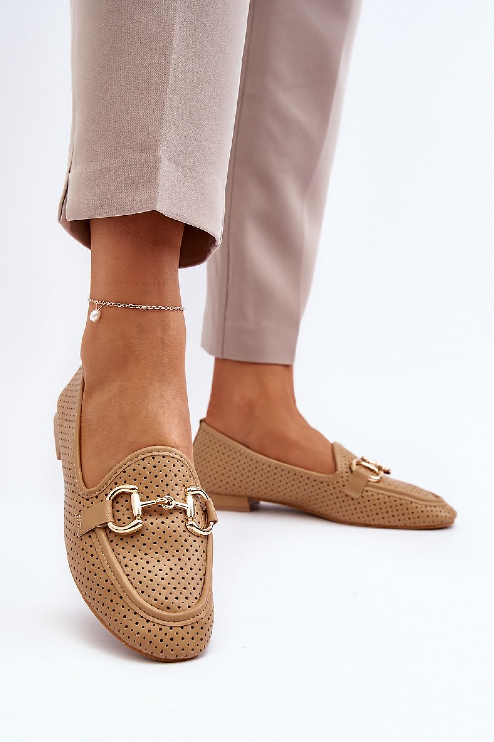 Close-up of Step in Style Moccasins featuring eco leather and decorative front ornament, epitomising elegance and comfort.