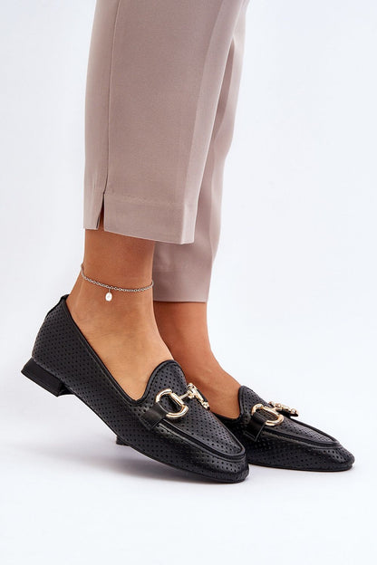 Step in Style's luxurious eco leather moccasin slip-ons, featuring a flat heel designed for both comfort and stylish wear.
